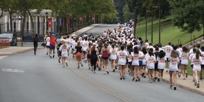 crowd of students running