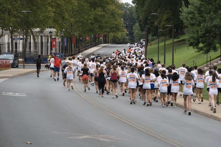 crowd of students running